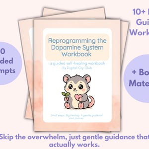 May include: A stack of workbooks with the title "Reprogramming the Dopamine System Workbook." The cover features a cute cartoon mouse holding a heart and a sprig. Includes "40 Guided Prompts" and "10+ Page Guided Workbook."
