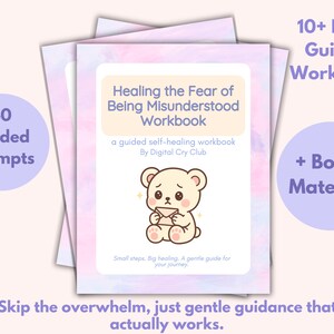 May include: A stack of workbooks titled "Healing the Fear of Being Misunderstood Workbook" with a cute bear illustration. The cover includes the text "40 Guided Prompts" and "10+ Page Guided Workbook + Bonus Material!"