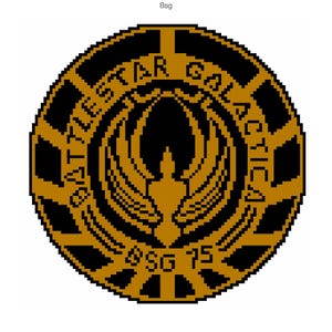 May include: A circular, gold and black emblem with the text "GALACTICA" and "STAR" in a circle around a stylised bird with wings spread.