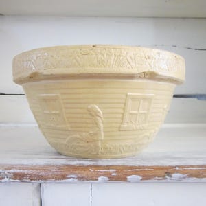 Primitive McCoy yellowware mixing bowl, girl with watering can, heavy stoneware bowl, vintage farmhouse kitchen, primitive pottery