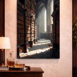May include: A painting depicting a library interior with rows of bookshelves. Sunlight streams through a tall window, illuminating the space. The artwork uses a palette of warm browns and blacks to create a sense of depth.