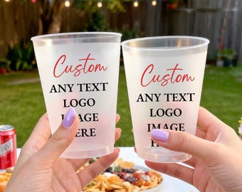 May include: Two translucent frosted plastic cups featuring the red script text Custom and black block text ANY TEXT LOGO IMAGE HERE printed on the front. The cups have a wide rim and a tapered base, designed for holding beverages at outdoor events.