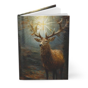 May include: A red deer stag with large antlers stands in a forest setting. A golden cross shines above the deer, surrounded by a bright light. The deer's fur is a rich brown color, and its eyes are dark. The background is a dark green and brown, with trees and leaves visible.