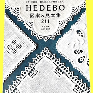 May include: A book cover with the title "HEDEBO" in large, bold letters, featuring white lace embroidery designs on a teal background. The book is titled "211" and includes Japanese text. The cover is surrounded by a yellow border.