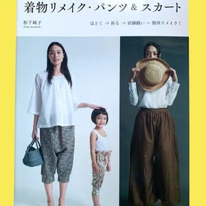 May include: A book cover with Japanese text and images of clothing. The title reads "Kimono Remake Pants & Skirts." The cover features a woman and a child wearing pants and a woman wearing a skirt. The background is yellow.