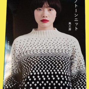 Könnte beinhalten: Ein Set aus drei Keramikbechern mit gesprenkelter, matter Oberfläche. Die Becher sind in den Farbtönen Creme, Hellgrau und Dunkelgrau gehalten. Jeder Becher hat ein schlichtes, minimalistisches Design, ideal für Kaffee oder Tee.