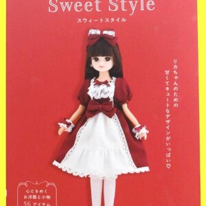 May include: A doll wearing a burgundy and white dress with a matching bow, standing in front of a red background. The text "Sweet Style" is displayed above the doll, with Japanese text above and below.