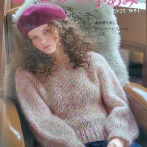May include: A woman wearing a burgundy beret and a speckled pink sweater. The sweater has long sleeves and a round neckline. The text on the cover reads "Let's knit series" and "2025/Autumn".