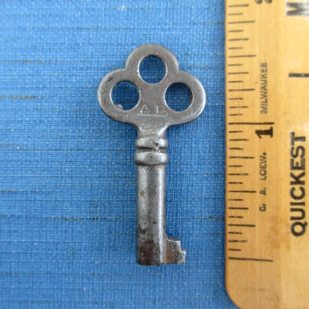 Antique Key Bow Design - Etsy