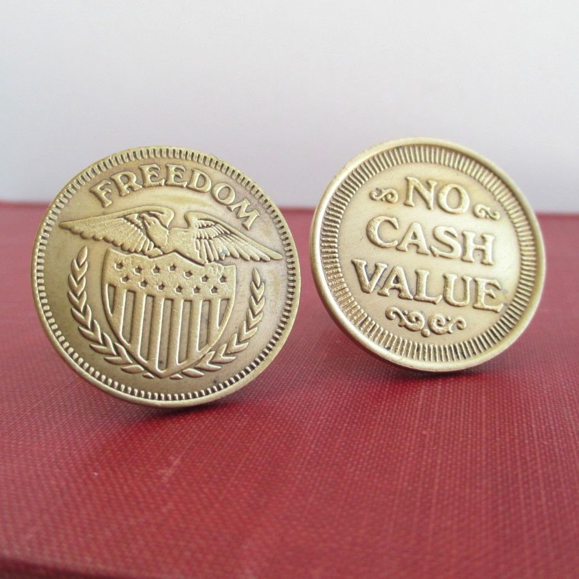 no cash value coin meaning