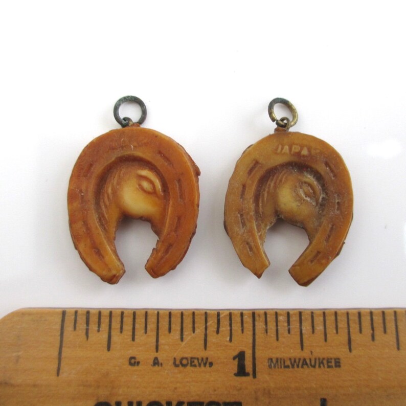 Vintage 2 Celluloid Horseshoe Horse Charms Brown