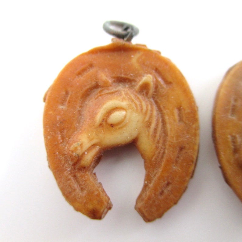 Vintage 2 Celluloid Horseshoe Horse Charms Brown