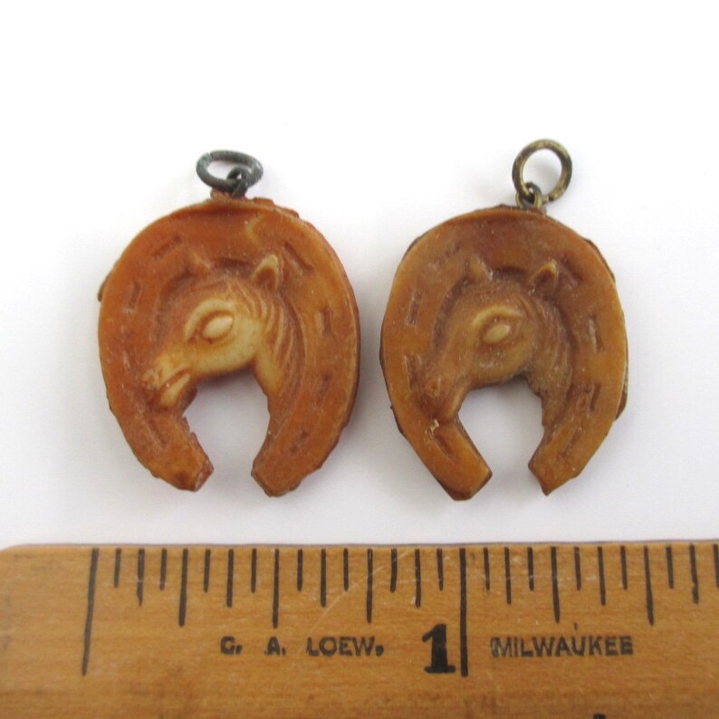 Vintage 2 Celluloid Horseshoe Horse Charms Brown