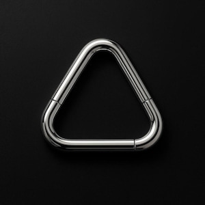 May include: A shiny, silver-colored metal triangle on a black background. The triangle is made of thick, curved bars that meet at three rounded corners. The metal has a polished, reflective surface.