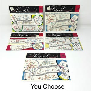 May include: A selection of Vogart embroidery transfer patterns. Designs include floral, animal, and heart motifs for towels and linens. The image includes the text "You Choose" at the bottom.