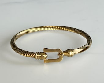 Pulsera de acero inoxidable chapada en oro de 18 quilates, resistente al deslustre.