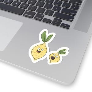 Cute Cartoon Lemon Duo, Citrus Buddies, Hand-Designed, Small Yellow Laptop Decal, 3-Inch Stickers for Crafting, Scrapbooks, and Fun Projects