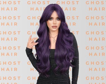 May include: A woman with long, wavy, purple hair. She is wearing a black long-sleeved top and a silver necklace. The background features the text "GHOST HAIR" in a repeating pattern.