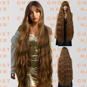 May include: A woman with long, wavy, light brown hair, wearing a gold dress and a white top. The image includes three additional views of the hair. The text "GHOST HAIR" is repeated in the background.