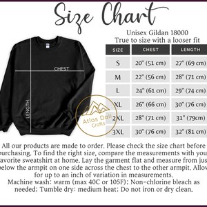 May include: Black Gildan 18000 sweatshirt with a size chart. The chart includes chest and length measurements in inches and centimeters for sizes S to 3XL. The text reads "True to size with a looser fit."