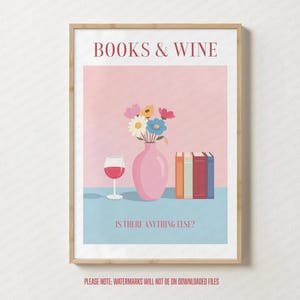 May include: A framed art print with the text "BOOKS & WINE" above a pink vase with flowers, a wine glass, and books. The text "IS THERE ANYTHING ELSE?" is below. The background is pink and blue.