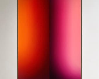 May include: A rectangular wall art piece featuring a vertical split composition. The left side displays a vibrant gradient transitioning from deep orange to bright red, while the right side shows a gradient from dark purple to light pink.
