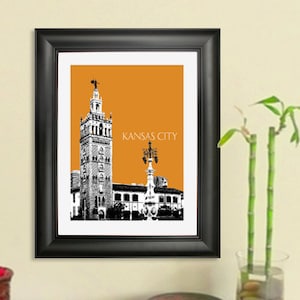 May include: A black and white illustration of a tall building with a spire, a street lamp, and the text "Kansas City" on a bright orange background. The illustration is framed in a black frame.