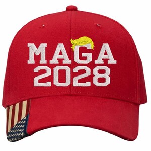 May include: Red baseball cap with a white embroidered American flag on the brim and the text "MAGA 2028" in white with a yellow cartoon hair style above the text.