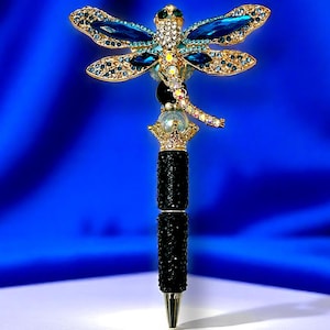 Hermoso bolígrafo de libélula azul