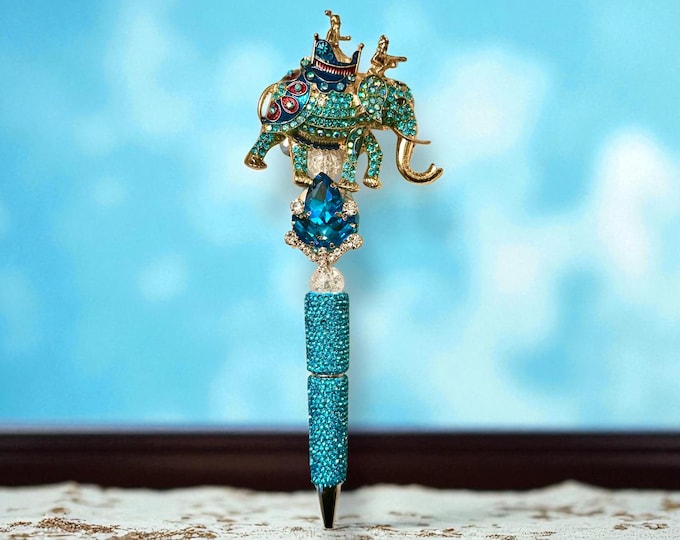 Majestic Jewel Encrusted Elephant Rhinestone Pen: Elevate your stationary needs.