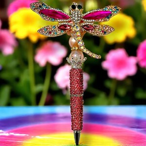 Hermoso bolígrafo con forma de libélula y diamantes de imitación