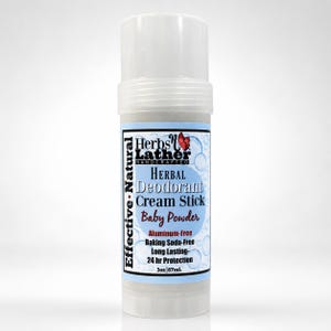 May include: A cylindrical deodorant cream stick with a clear plastic cap. The label features the text Herbs n Lather Handcrafted, Herbal Deodorant Cream Stick, Baby Powder, Aluminium-Free, Baking Soda-Free, Long Lasting, 24 hr Protection, 87mL.