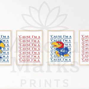 May include: Four framed prints with a light wood finish. Each print features the text "'CAUSE I'M A" in red and blue, with the word "JAYHAWK" repeated. One print includes a cartoon Jayhawk mascot.