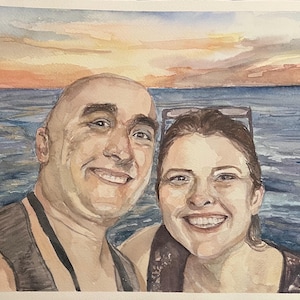 In this watercolor painting, a man and woman are smiling posing by a sunset over the water