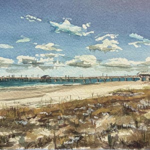 This is a watercolor painting of a beach in Gulf Shores. There is a pier, and it is a sunny day