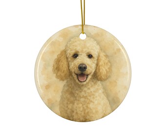 May include: A round, cream-colored ornament featuring a watercolor-style portrait of a smiling poodle. The poodle has light brown fur and is set against a soft, beige background. A gold string is attached for hanging. A charming holiday decoration.