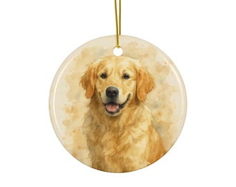 May include: Round ceramic ornament featuring a watercolor painting of a Golden Retriever dog. The dog has a golden coat and is smiling. The background has a soft, watercolor wash effect. A gold string is attached for hanging.