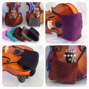 May include: A set of violin shoulder rests in various colors, including black, brown, purple, and gray. The rests are made of soft, plush fabric and are designed to provide comfort and support for the violin player.