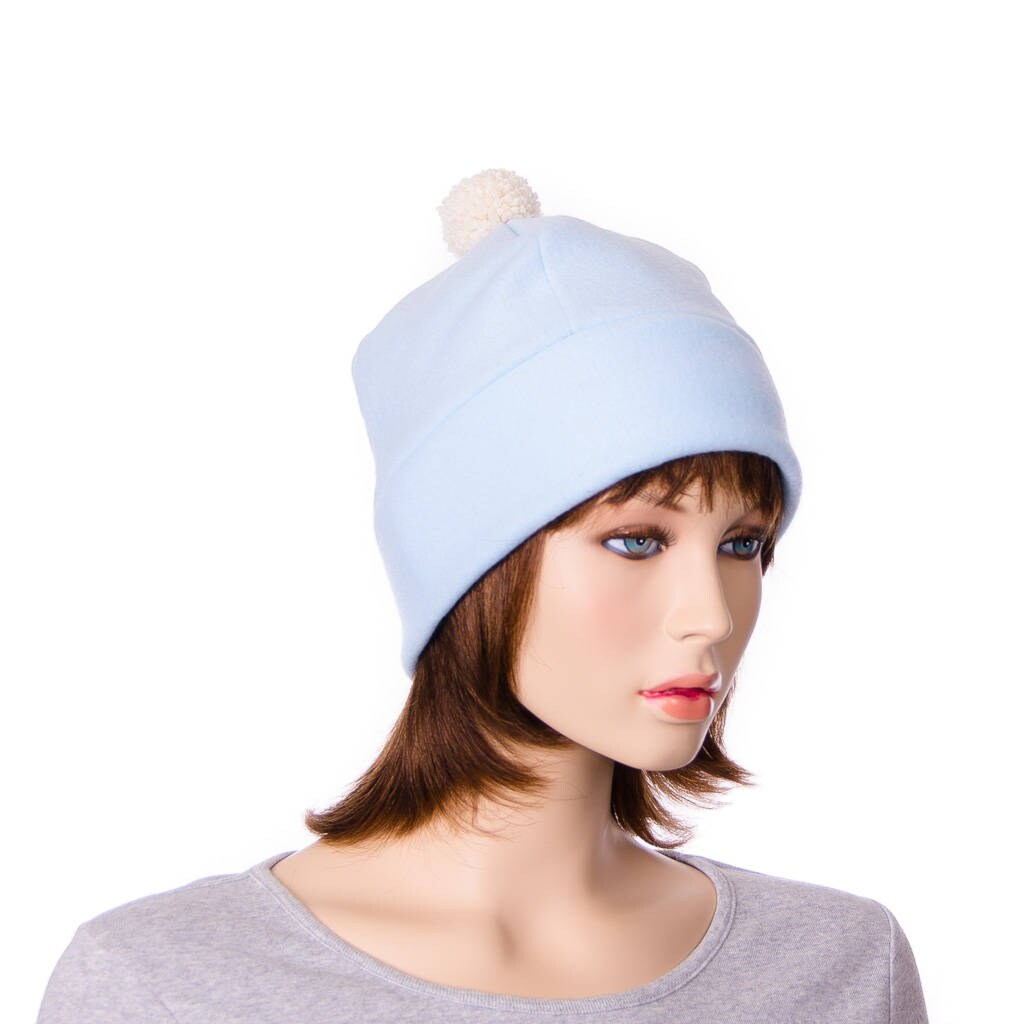 skull cap with ball on top