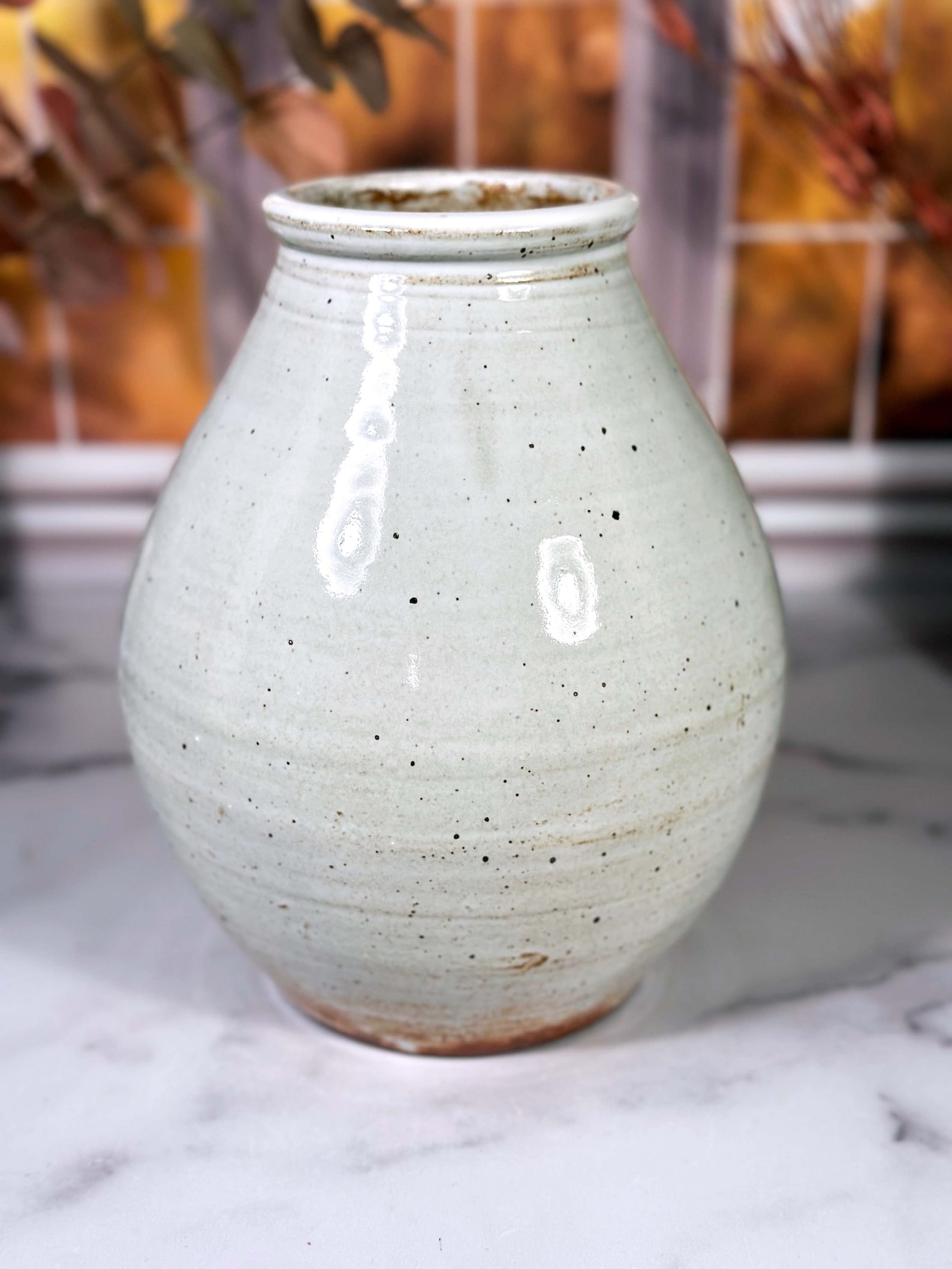 Speckled white stoneware vase for a cowgirl coastal bedroom