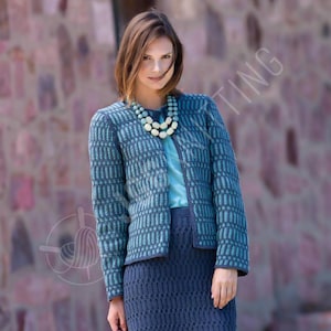 May include: A woman wearing a blue knit jacket and matching skirt. The jacket is open, revealing a light blue top and a cream-colored necklace. The knitwear features a textured pattern in shades of blue.