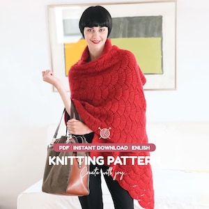 May include: A bright red knitted shawl featuring a repeating fan-like texture pattern. The shawl is draped over the shoulders. A brown and olive green handbag is held in one hand. Text on the image reads: PDF INSTANT DOWNLOAD ENLISH KNITTING PATTERN.
