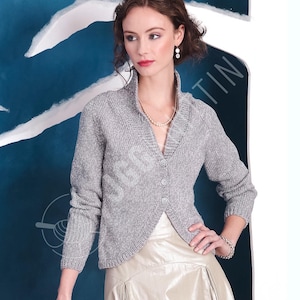 May include: A light grey knitted cardigan with a V-neck and button fastening. The cardigan features long sleeves and a ribbed texture. The model is wearing a pearl necklace and bracelet. The background is a blue and white abstract design.