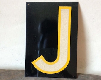 vintage reflective metal sign letter J