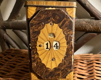 antique lithographed English perpetual calendar Lyon's tea tin shell motif on all sides