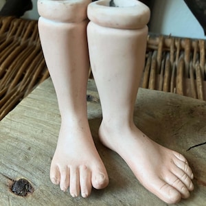 vintage pair of ceramic doll puppet legs bare feet