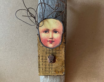 Lesaet face assemblage vintage and found objects