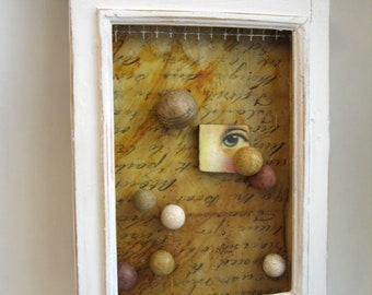 EYESCAPE  handcrafted assemblage