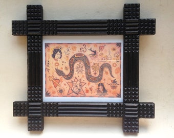 artisan created tramp art style frame with copy of print