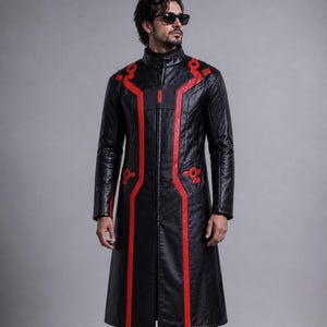 May include: A black leather coat with red accents. The coat features a high collar, a full-length zipper, and red stripes running down the front and along the shoulders. The coat has a quilted pattern on the upper sleeves.